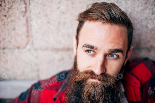 Preview: Portrait of man with beard looking away