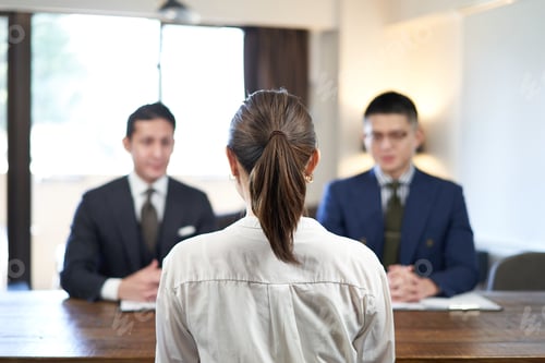 Preview: Asian female business woman interviewed in business casual