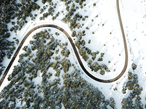 Preview: A hairpin turn in the snowy mountains.