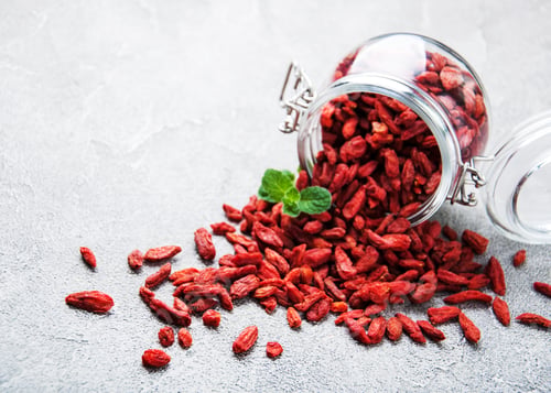 Preview: Goji Berries Spilling from Jar with Mint