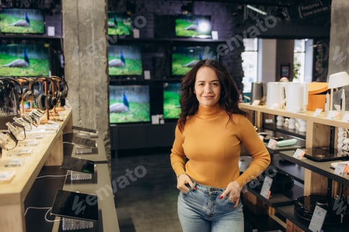 Preview: Portrait of a young woman in an electronics store