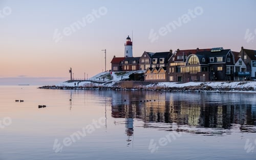 Preview: Lighthhouse of Urk Netherlands during sunset in the Netherlands