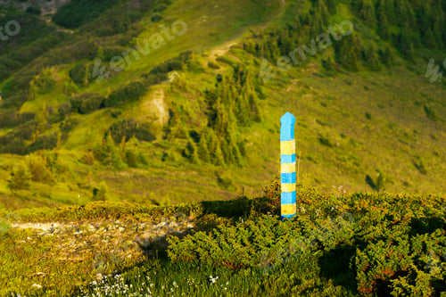 Preview: Yellow and blue border post on Ukraine and Romania state border