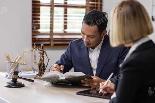 Preview: Business Asian people and lawyers, Businessman and lawyer discuss the contract document. Judge gavel