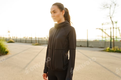 Preview: Attractive young asian sports woman