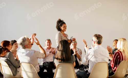Preview: People sitting and talking with a group