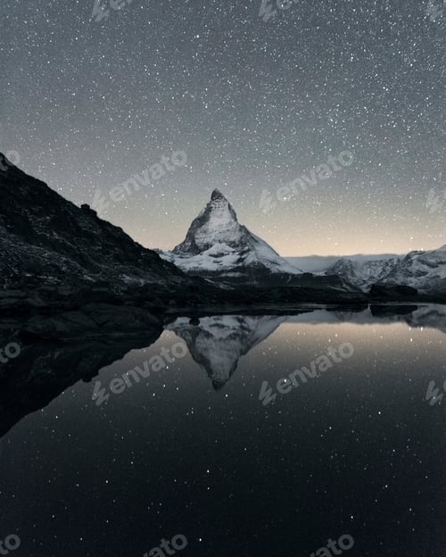 Preview: Matterhorn reflecting over Lake Riffelsee at night, Zermatt, Valais, Switzerland