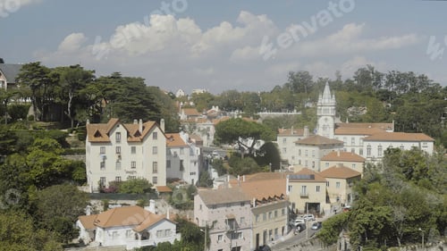 Preview: Beautiful view of ancient resort town with castle towers. Action. Beautiful white buildings of old