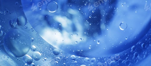 Preview: Oil bubbles close up. circles of water macro. abstract light blue background