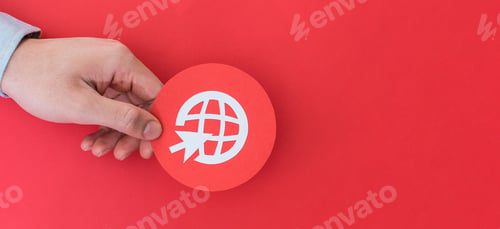 Preview: Male hand holding global shape symbol on red background - community concept