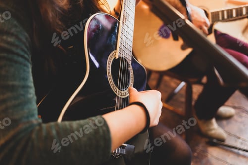 Preview: Playing classic guitar. Selective focus.