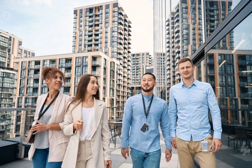 Preview: Corporate workers strolling outside during lunch break