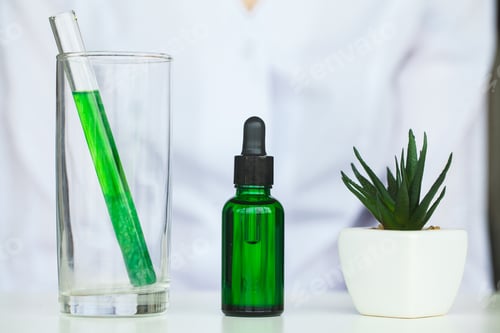 Preview: Close Up Of Scientist Checking Test Tube In Laboratory.