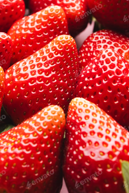 Preview: Close up of strawberries and copy space on pink background