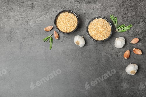 Preview: Flat lay composition with garlic products on grey background
