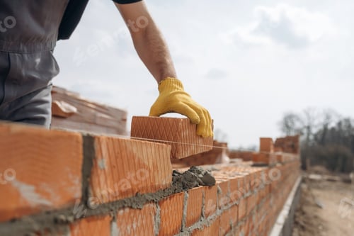 Preview: Making the wall. Close up view of construction man that is working with bricks
