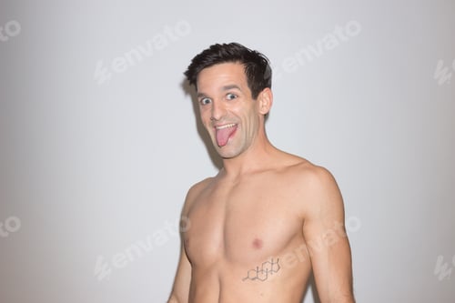 Preview: Man Playful Studio Head Face Portrait, White Studio Background.