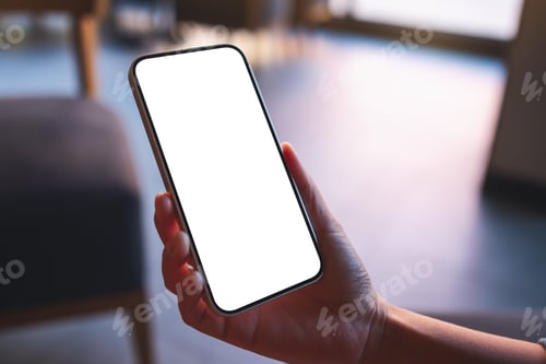 Preview: Mockup image of a woman holding and using mobile phone with blank desktop screen