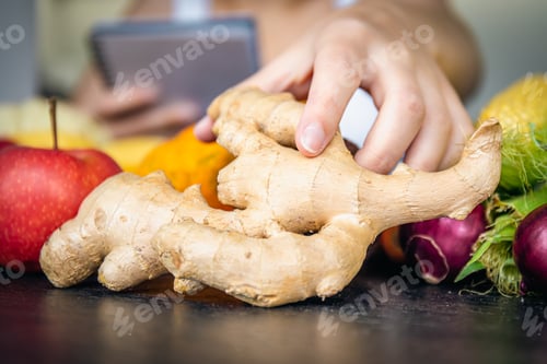 Preview: Close-up, ginger root on the kitchen table.