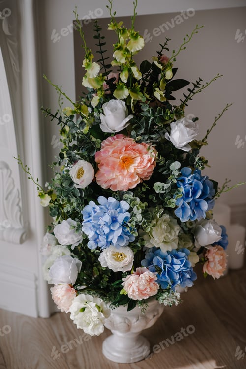 Preview: Big bouquet of fresh flowers, pink, blue hydrangeas, white roses and greenery in vase.Wedding flower