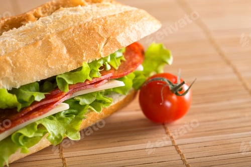 Preview: Sandwich with salami, cheese and lettuce