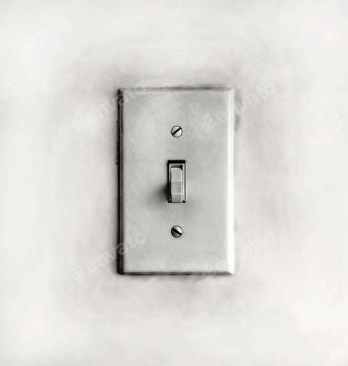 Preview: Closeup of a grungy dirty old white light switch on a wall