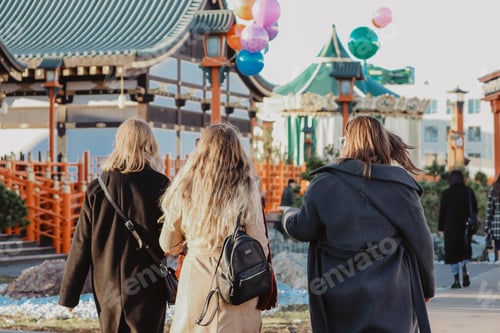 Preview: Friends walking outdoors with a beautiful background