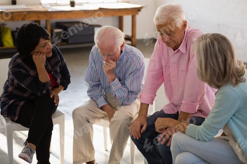 Preview: Female of friends consoling worried male friends