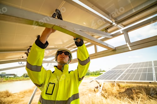 Preview: Technicians installing photovoltaic solar panels.