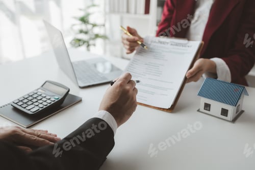 Preview: The broker is calculating the buyer's monthly instalment payments, Real estate broker agent presenti