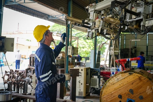 Preview: Robotic Arm engineer check on equipment in its with software of Artificial Intelligence Unit.