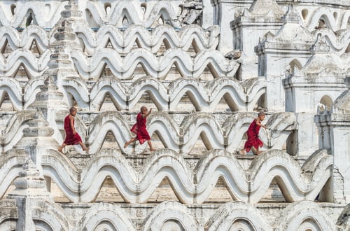 Preview: Three young monk are running and jumping on the Mya Thein Tan Pagoda at bagan,