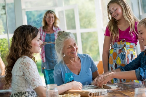 Preview: Farmhouse in the country in New York State. Four generations of women in a family baking together.