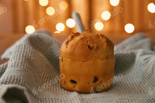 Preview: Christmas bread with dishtowel and Christmas lights in background