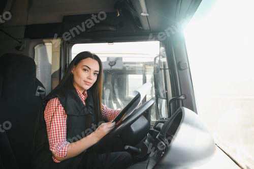 Preview: Portrait of beautiful young woman professional truck driver sitting and resting after long drive.