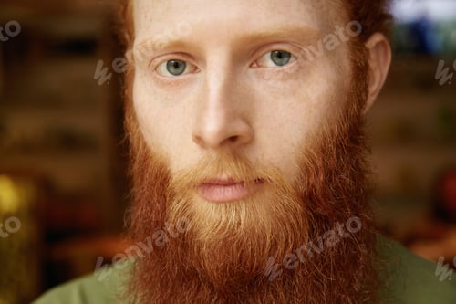Preview: Human emotions and feelings. Headshot of attractive unhappy young redhead student with freckles and