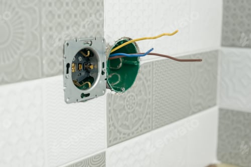 Preview: Preparing to install an electrical outlet. Renovation and construction in kitchen.