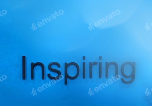 Preview: Black texts say “Inspiring” on blue wall