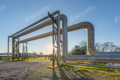 Preview: Geothermal energy. Pipelines at sunset in Larderello, Tuscany region, Italy