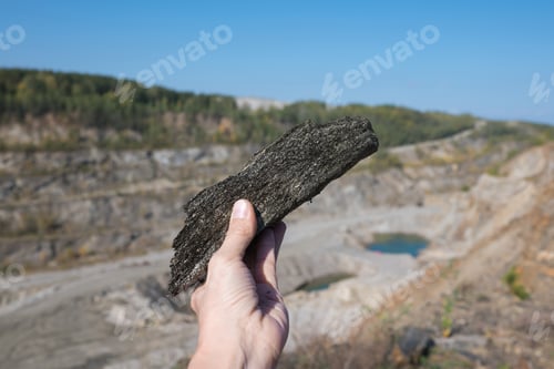 Preview: Mining Site Featuring Graphite Deposit, Mineral Production, and Natural Stone Surroundings