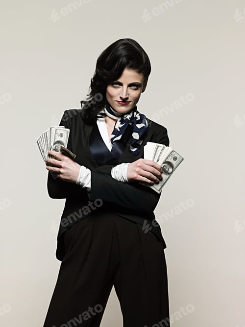 Preview: Businesswoman holding money