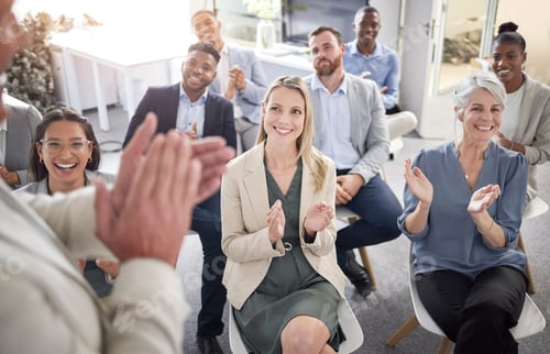 Preview: Shot of a group of businesspeople clapping hands in a meeting at work