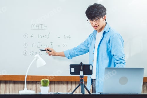 Preview: Teacher addressing university students in a classroom