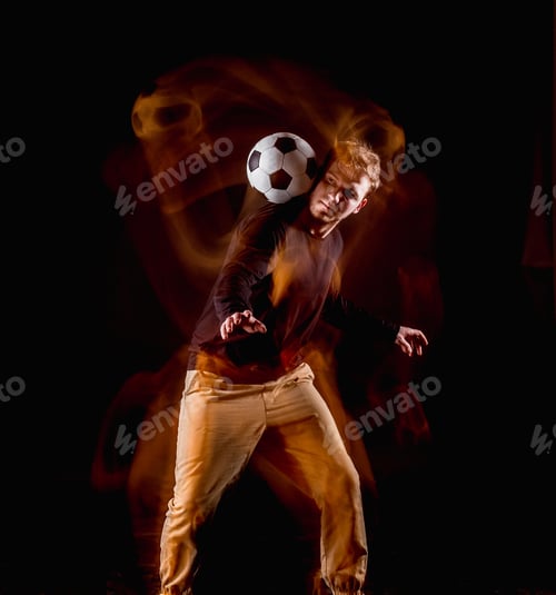 Preview: A Portrait Of A Fan With Ball On Gray Studio Background. Freestile