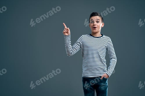Preview: Fashionable boy on a gray background