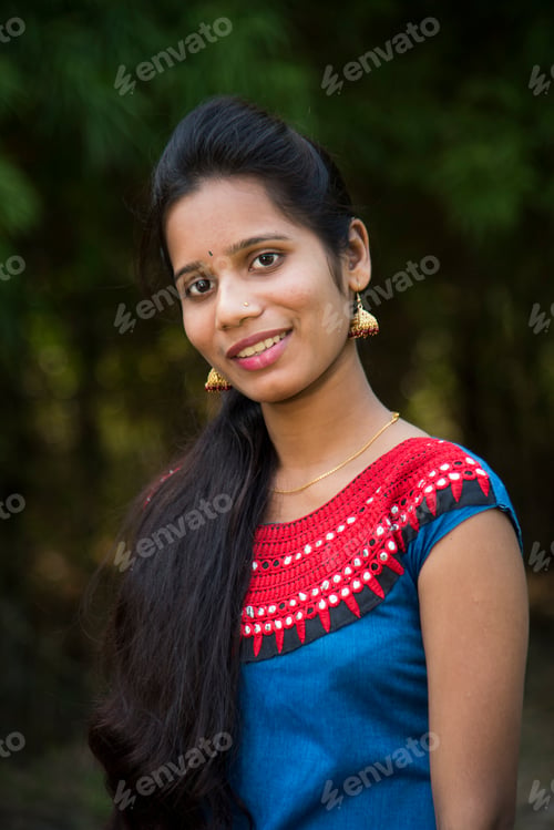 Preview: Outdoor portrait of beautiful young Indian girl in the park