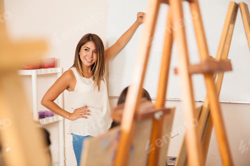 Preview: Happy teacher during art class
