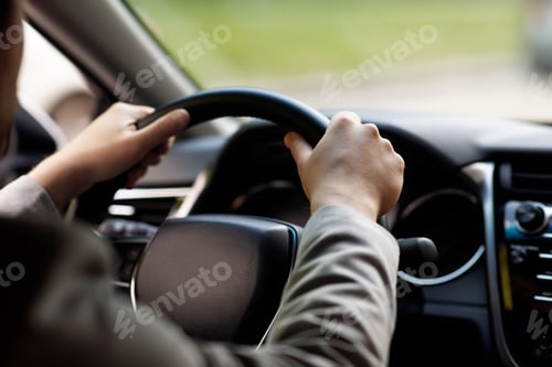 Preview: Sale and rental transport. Driver holding steering wheel sitting in new auto, enjoy road trip to