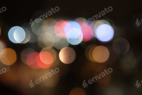 Preview: multicolour defocused glitter lights background. Rounded defocused lights. Abstract bokeh back.