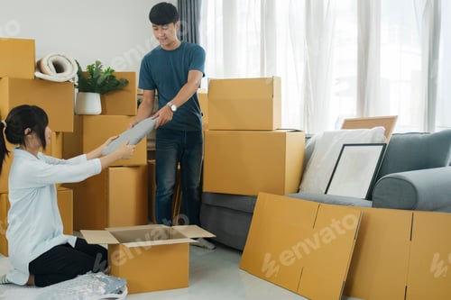 Preview: Young married couple moving into new home.